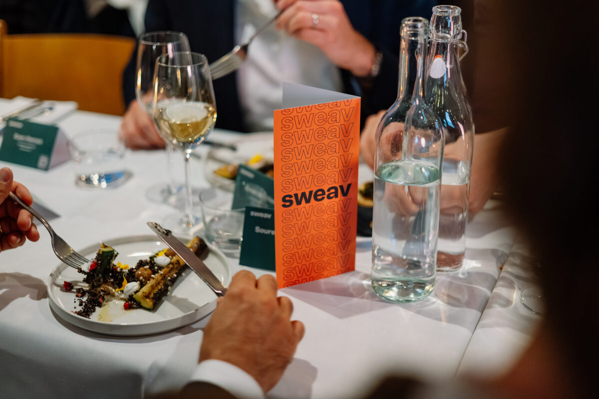 table setting with Sweav branding